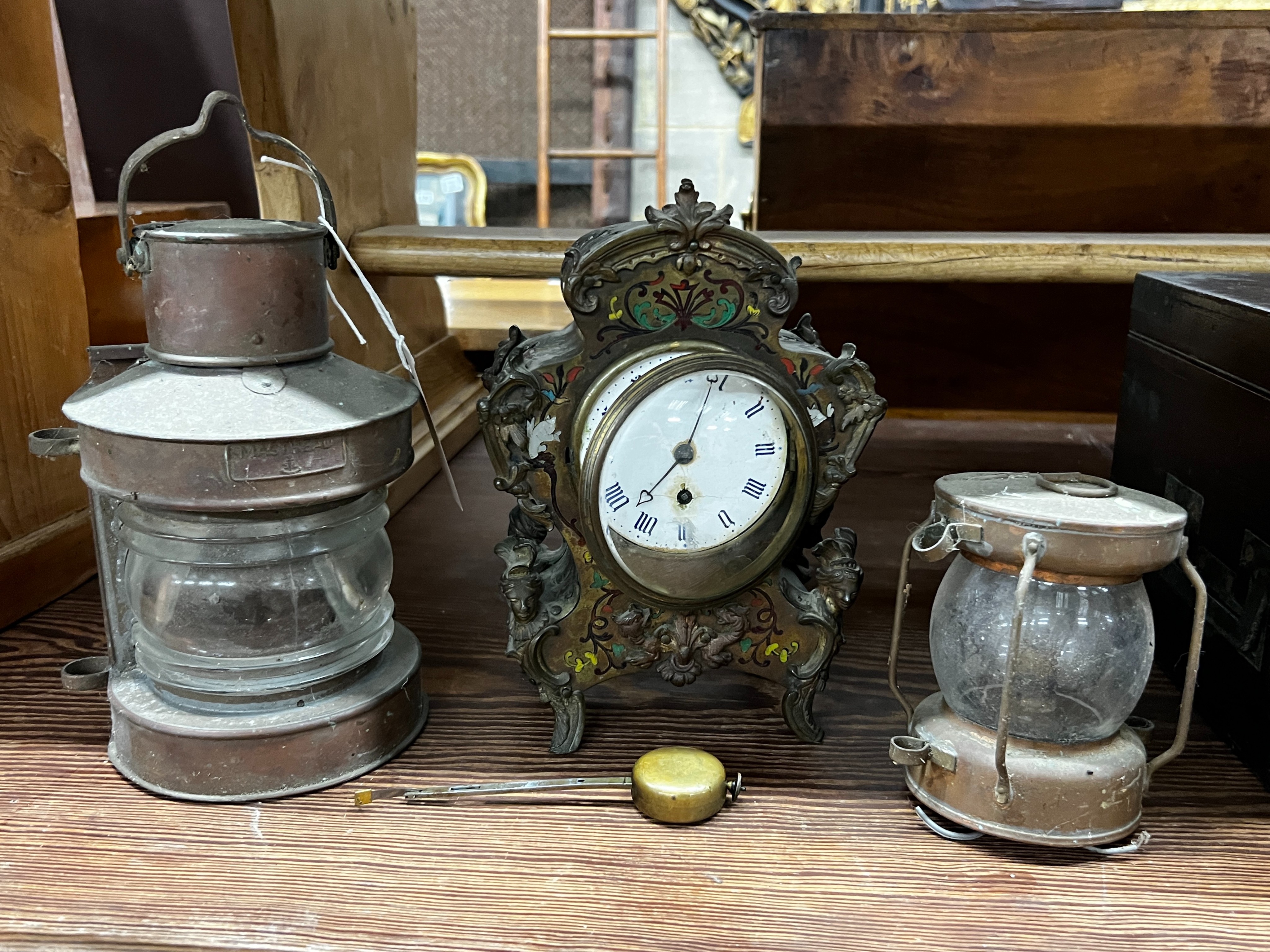 A 19th century mahogany cutlery box, width 46cm, two miniature ship's lanterns and a French inlaid mantel clock